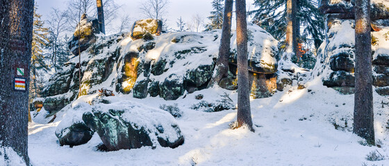 Sandstone rock formations on a hiking trail during a winter hike in the Table Mountains.
