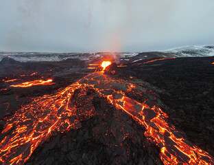 lava eruption volcano aerial view
drone view from Iceland of Hot lava and magma coming out of the...