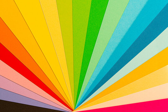 Abstract Rainbow Colorful Paper Background.Layout colors. Rainbow fan.  Colored sheets. Stock Photo