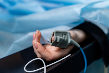 Obraz na płótnie Canvas Modern medical equipment measuring patient oxygen. Hospital medicine device monitoring patient health.
