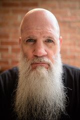 Portrait of mature man with long gray beard