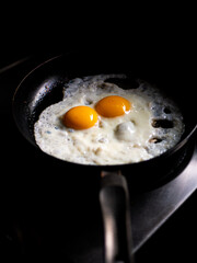 beautiful fried eggs in pan
