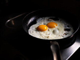 beautiful fried eggs in pan