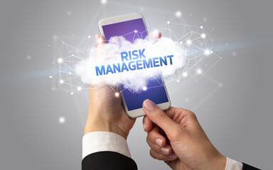 Hand using smartphone with cloud business concept