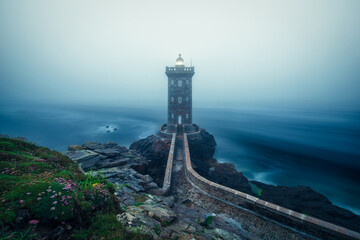 Fototapeta na wymiar Kermorvan lighthouse marking the harbor of Le Conquet, Britanny, France