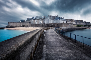 Saint-Malo, pier and town, Brittany, France - obrazy, fototapety, plakaty