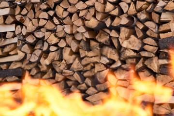 Burning firewood flame, close-up. Fire embers
