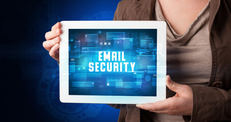 Person holding tablet, security concept