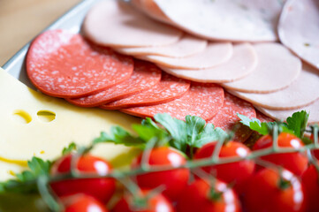 vine tomatoes on a sausage platter
