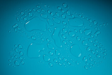 Water Drops on Blue Background. World Water Day Concept. Droplet Texture Surface. Environment Care. CSR, Corporate Social Responsibility or CSC, Corporate Social Contribution