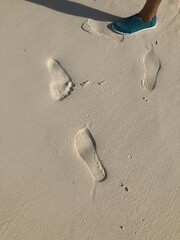 footprints on the beach