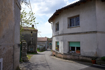 Fototapeta na wymiar street in the old village opatje selo na kris, carst, craso, Slovenia
