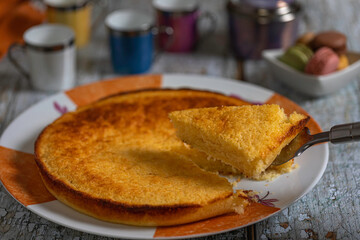 Lemon cake with a cup of black coffee.