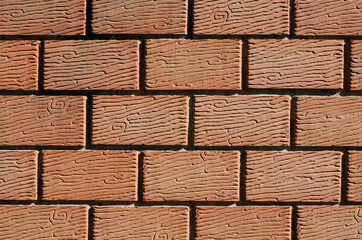 Red vintage brick. The structure of the stone. Brick wall.