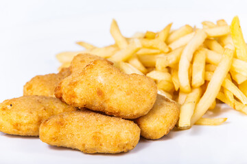 Fried cheese nuggets with french fries. The food in the restaurant. Food styling and restaurant meal serving.