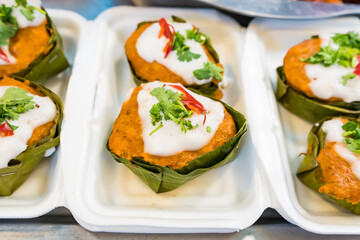 steamed fish with curry paste in market thailnad.