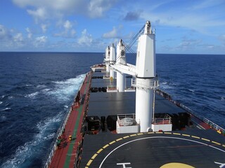 A bulk carrier type ship is underway at sea © Antony