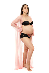 Naklejka premium Pregnant woman posing isolated on white