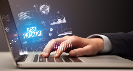 Businessman working on laptop, business concept