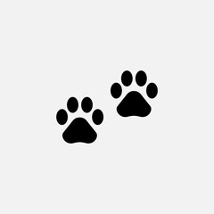 Vector illustration. Cat paw prints logo. Black on white background. Animal paw print with claws.