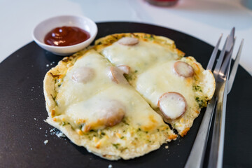 Homemade pizza in a cafe at Thailand.