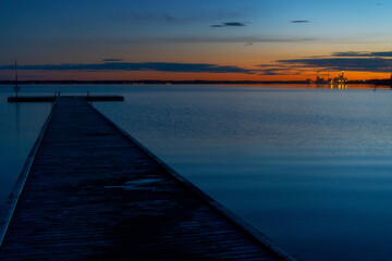 Obraz na płótnie Canvas sunset over the pier. sunset over the lake
