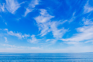 Naklejka na ściany i meble Beautiful calm blue sea and sky