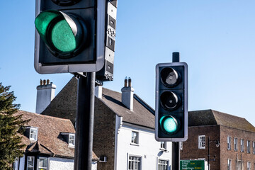 Traffic Lights On Green Controlling Road Traffic With No People - Powered by Adobe