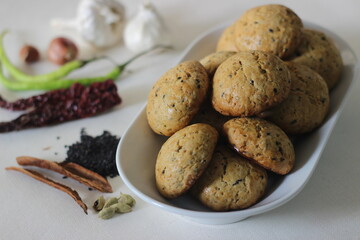 Home baked masala cookies. Sweet and spicy cookies with flavours of shallots, garlic, cinnamon, cardamom, fennel seeds and other spices