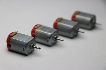 Set of toy dc motors which are commonly found on remote control toys on white background