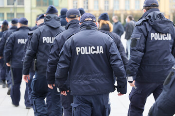 Oddział polskiej policji podczas akcji zabezpieczenia miasta. © FotoDax