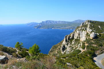 Stunning panoramic view from cliff Cap Canaille towards the bay of the town Cassis in Provence-Alpes-Côte d'Azur, France, Calanque coast, serpentine road
