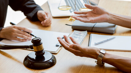 Good service, consultation of male businessmen and male lawyers or judge advisors, having team meetings with clients, legal concepts in the office