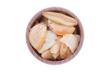 dried garlic flakes in wooden bowl