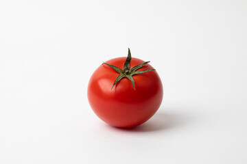 Fresh red tomato isolated on white background