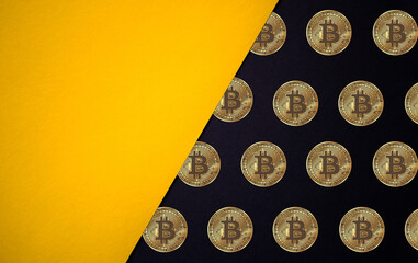 Bitcoin cryptocurrency black and yellow background with copy space