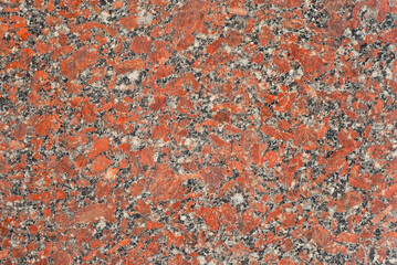 Texture of red, black and white marble. Stone tile with natural pattern. Marble pavement closeup.