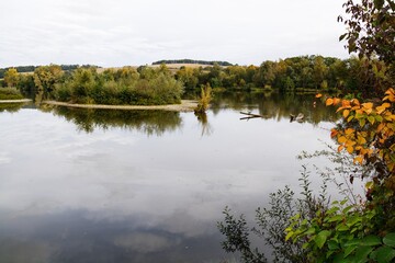 Autumn morning at the old abandoned gravel pit near Milotice over Becva. Moravia. Czechia. Europe. 