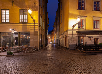 Stockholm. Old narrow medieval street in night lighting.