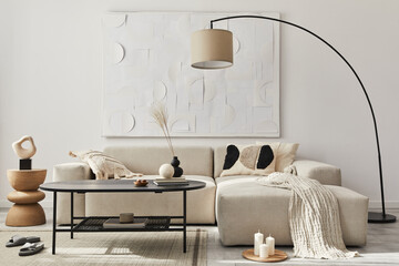 Modern concept of living room interior with design sofa, pillow, blanket, art painitngs , side...