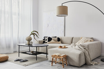 Domestic interior of living room with design modular sofa, black coffee table, lamp, decoration,...