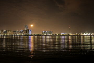 Fototapeta premium view of the city skyline at night, Abu Dhabi