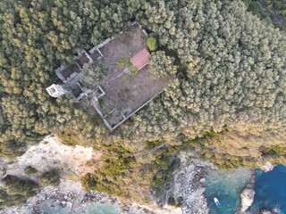 defaultAerial shot, Ruins Of Abandoned Byzantine Monastery Of Vlachernas stonebuilt on Hill Near Valtos Beach in Parga Greece Epirus, Preveza,