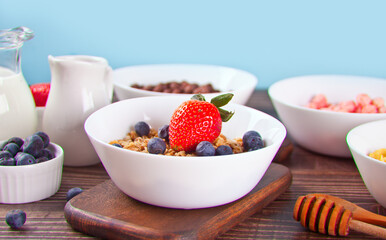 Healthy breakfast. Granola, muesli with fresh berries.