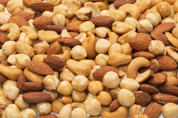 Mix of nuts isolated on white background. Top view.