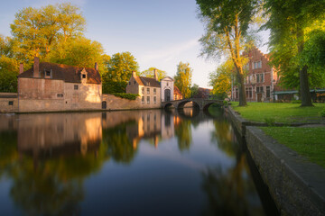 Fototapeta na wymiar Bruges canals at sunrise. Brugge, Belgium