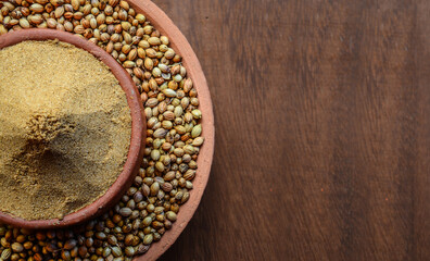 Raw Coriander with powdered coriander still life photograph