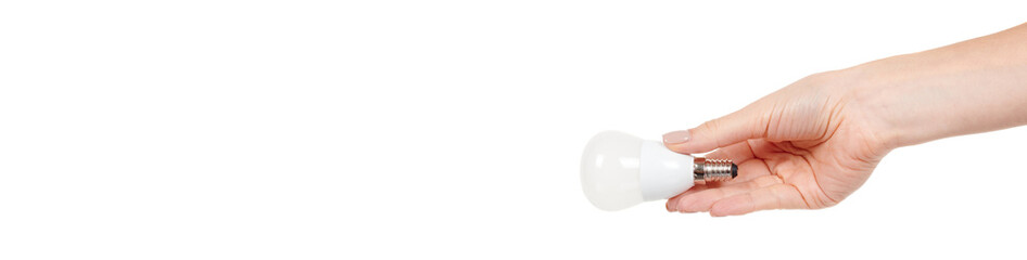 Hand with white LED bulb isolated on white background.