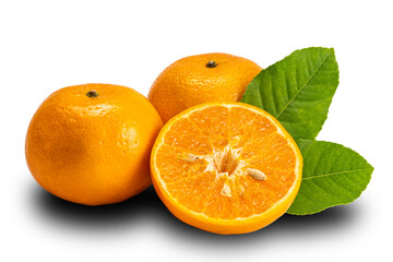 Side view of mandarin orange whole and half with leaves on white background with clipping path. Mandarin oranges or Citrus reticulata are in the same family as oranges, lemons, limes, and grapefruit.