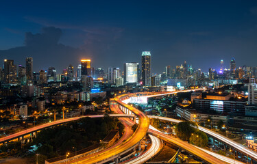 Fototapeta na wymiar Expressway and the city of Bangkok landscape evening top view